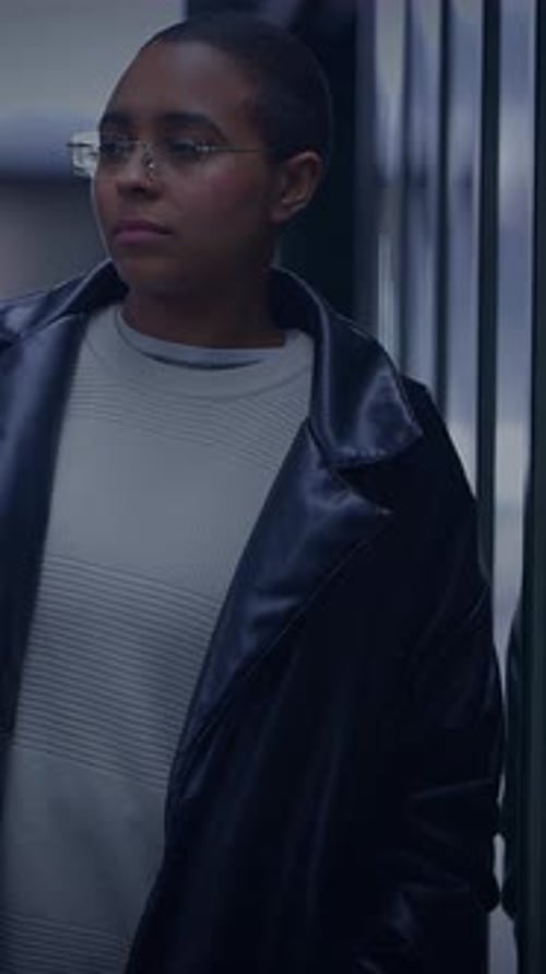 Stylish Young Adult Poses in Urban Fashion Scene