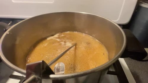Sugaring the boiling process to make Maple Syrup