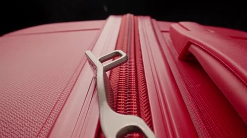 Red Suitcase Zipper Opening Close-Up