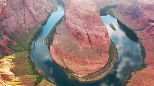 Cinematic shot , aerial drone view of Horseshoe Bend, a horseshoe shaped canyon high above the Color