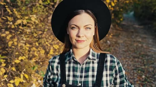 Hipster Woman Rejoices Autumn in Park Beautiful Golden Nature Portrait in Park