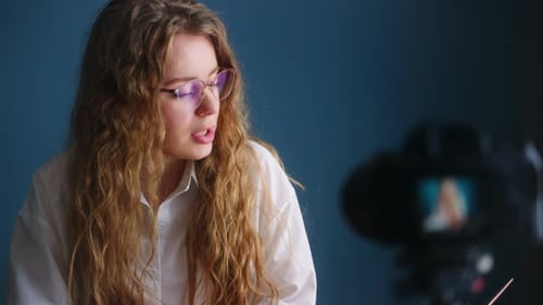 Woman Delivers Engaging Presentation In Front of Camera