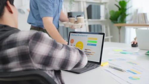 Close up of young businessman and woman people working in modern office.