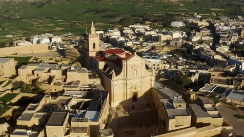 Aerial View Over Cathedral Of The Assumption In Victoria, Capital Of The Island Of Gozo In Malta - d