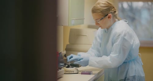 Female Lab Technician Works With Medical Samples