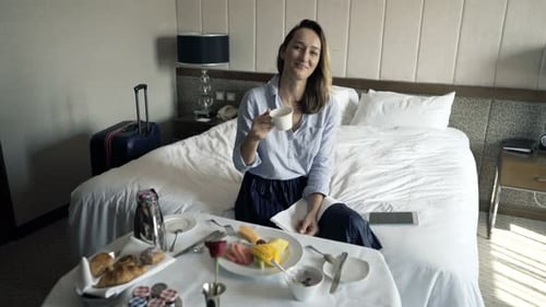 Portrait of Happy, Pretty Businesswoman Sitting During Breakfast in Hotel Room 30s