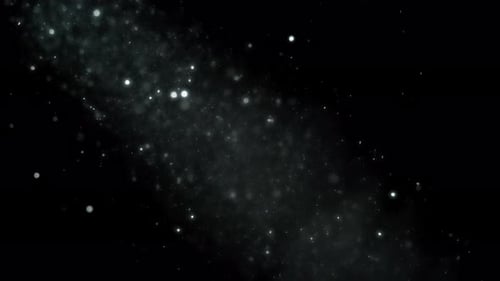 Particles floating under beam of light