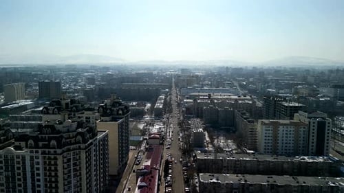 Streets of Bishkek city during winter time, drone shot