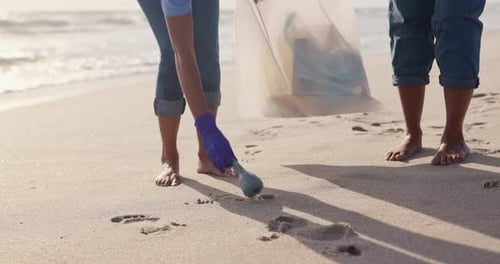 Volunteer, beach and cleaning garbage for environment community service for pollution