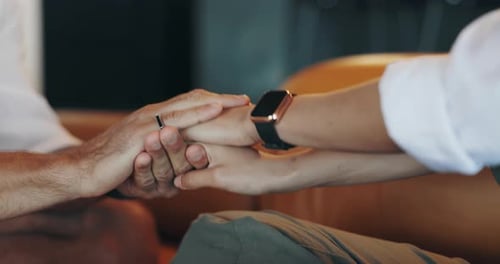 Couple Holding Hands, Intimate Indoor Moment