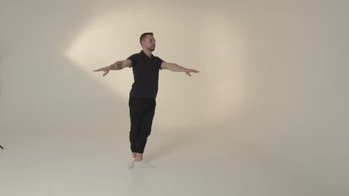 An Elegant and Graceful Dance Movement Captured in a Beautiful Studio Setting and Atmosphere