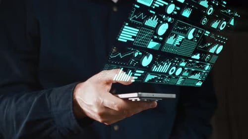Gentleman Observes And Analyzes Dispersed Electronic Funds And Data In Professional Environment