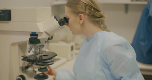 Focused Scientist Working in Laboratory