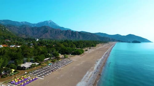 Aerial Drone View of a Serene Beach and Turquoise Sea