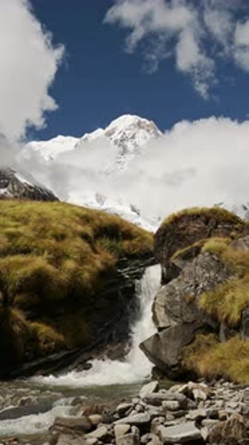 Vertical Small Waterfall Stream Landscape in Himalayas Mountains in Nepal, Vertical Video for Social