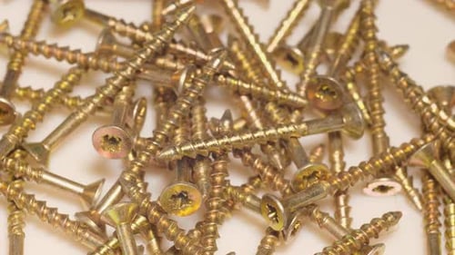 Gold Screws in a Jumble Close Up