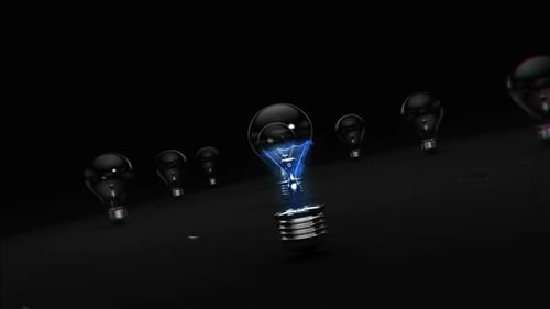 Exploding Light Bulbs With Blue Energy Effects on black
