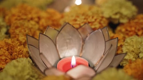 Candlelight inside Lotus Flower with Marigolds
