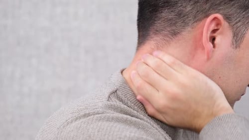 Adult Massaging Neck Muscle for Relaxation