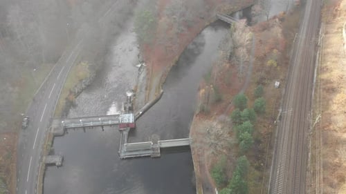 Aerial Shot of Small Hydroelectric Dam in River, High Angle Frame Fill