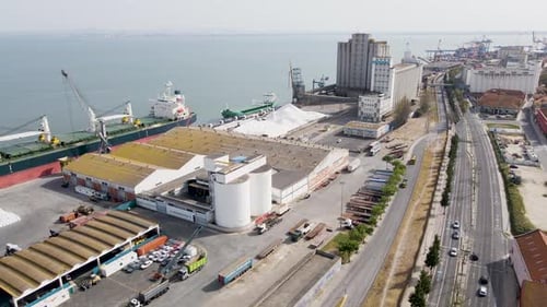 Aerial view of cargo ships at harbor, Portugal.