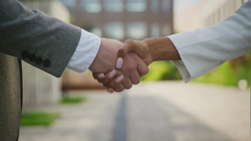 Professional Business Handshake in an Urban Setting