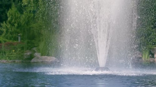Fountain Garden. Water Fountain in Garden. Splashing Streams of Fountain Water. Water