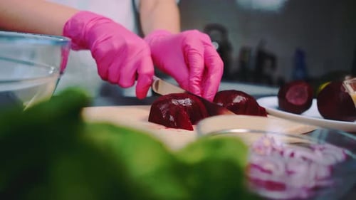Cutting Beetroot on a Cutting Board