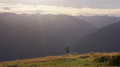 Man Running on Mountain During Sunrise
