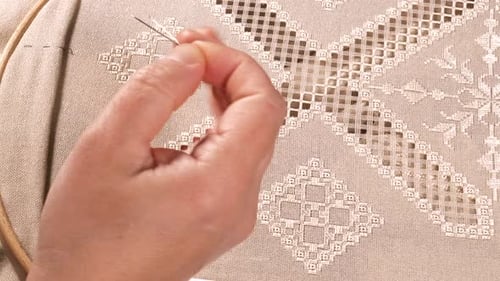 Hand Embroidering Elegant Pattern on Fabric