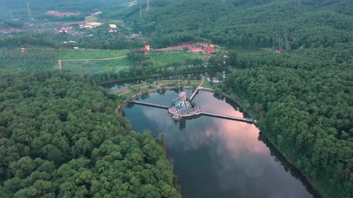 Aerial of Ho Thuy Tien abandoned water park with huge dragon structure and empty lake in Hue, Vietna