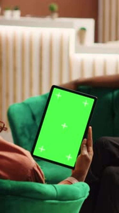Vertical Video Guests in Hotel Holding Mock Up Tablet