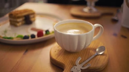 Coffee and Delicious Layered Dessert Arrangement Close-Up