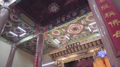 Colorful Details In The Shrine Of Bodhisattva In Kek Lok Si Temple In Malaysia - Panning shot