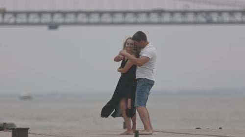 A Cute Romantic Married Couple Dancing on the Pier