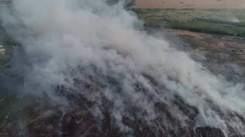 Burning Garbage and Household Waste Dump Aerial View