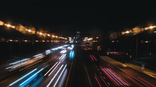 Night time lapse of busy highway