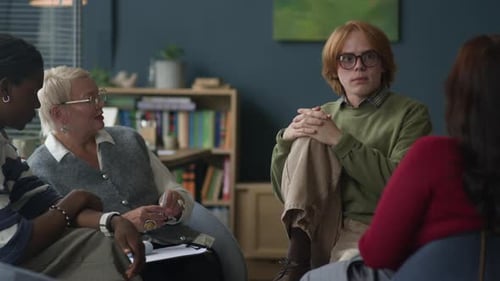 Group of Adults in a Meeting in a Home
