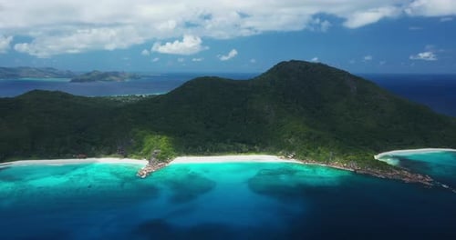 Aerial view over the crystal clear water on La Digue Island in the Seychelles, Africa.