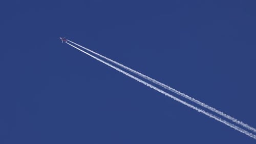 The Journey Begins Plane Flies High in the Sky Leaving a White Trail Jet Airplane Flying Overhead in