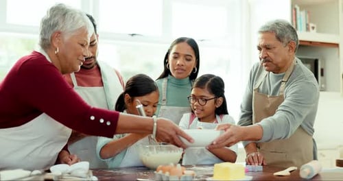 Family Bakes Together in Bright Kitchen