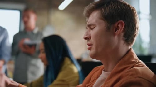 Tired Office Team Discussing Business Problem in Conference Room Business Staff