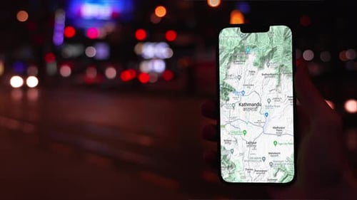 Phone Displaying a Kathmandu Map at Night