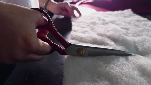 Cutting White Material with Scissors