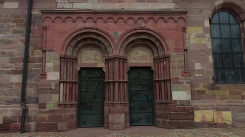 Ornate Doors and Stonework on Historic Building Exterior