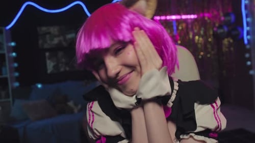 Smiling Woman With Pink Wig and Cat Ears