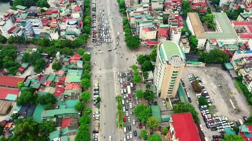 Drone, city and traffic on road, buildings or transportation with infrastructure