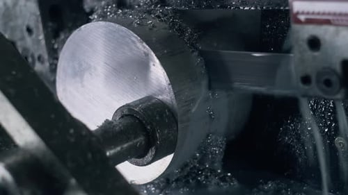 Band Saw Cuts Steel Pipe and Uses Coolant Liquid