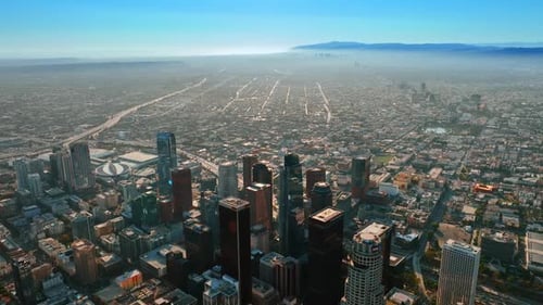 Descending over the vast cityscape of modern Los Angeles, California, USA.