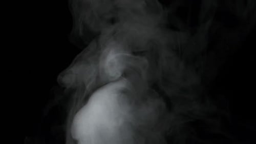 Billowing White Smoke on a Black Background